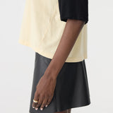 Bassike Contrast Raglan Short Sleeve T-Shirt in Black and Lemon Glaze