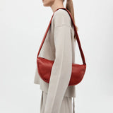 St Agni Soft Crescent Bag in Rosso