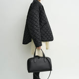 Toteme Collared Quilted Jacket in Black