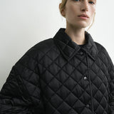 Toteme Collared Quilted Jacket in Black