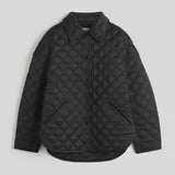 Toteme Collared Quilted Jacket in Black