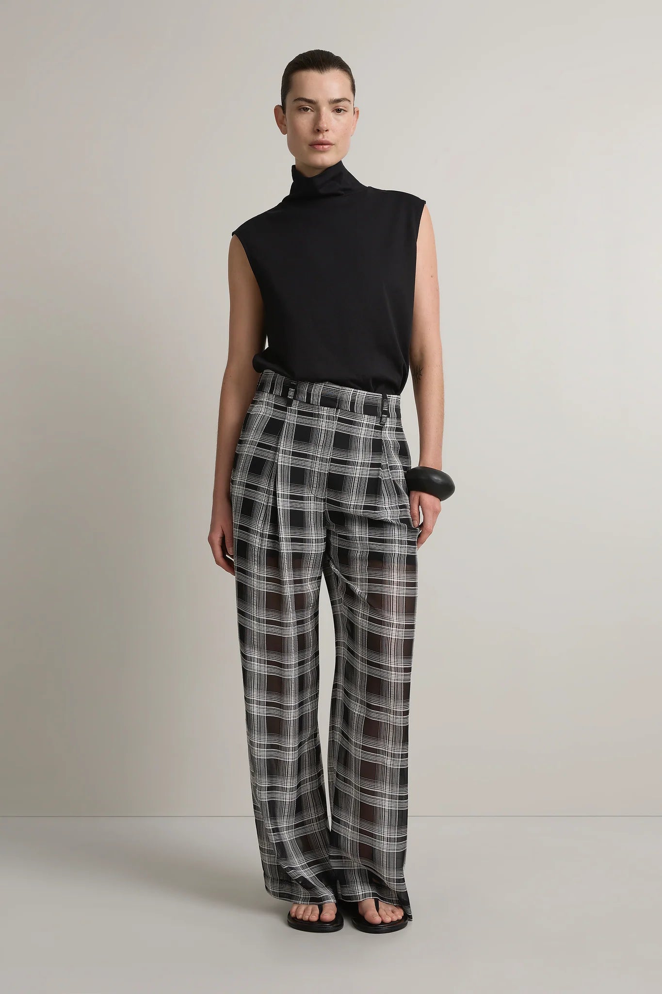 A Emery Goddard Sheer Pant in Black And White Check - side view