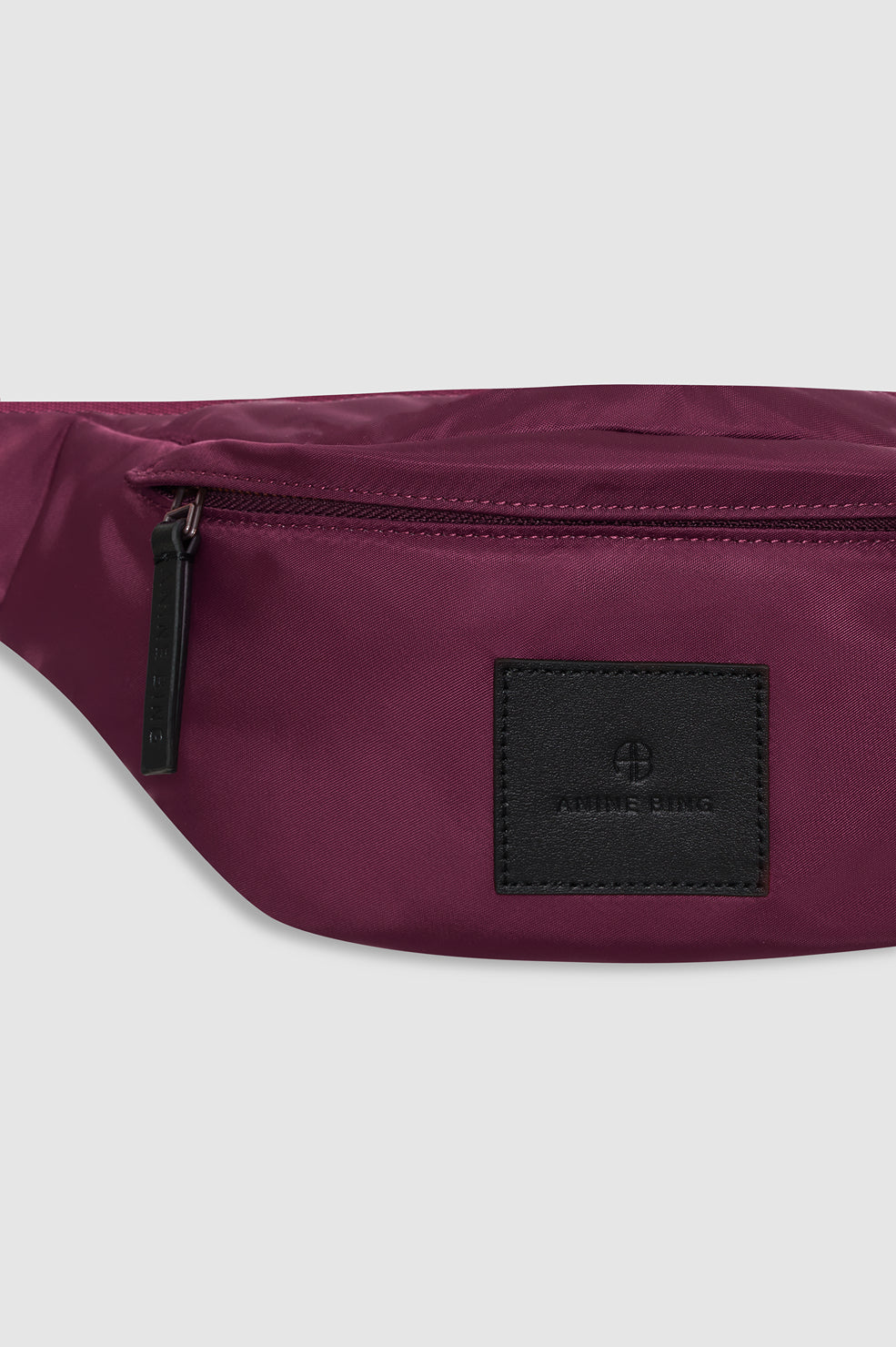 Anine Bing Leon Small Waist Bag Nylon in Fig - styled look
